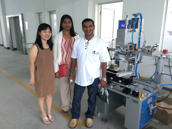 Malaysia customers visited us and took the training on the multi functional hot stamping machine model 6B for oval bottles